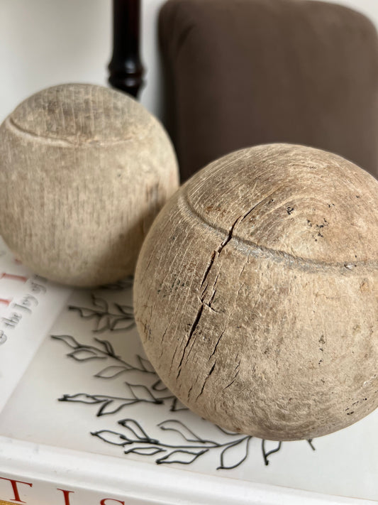 Pair of Antique Weathered Wooden Bowling Balls